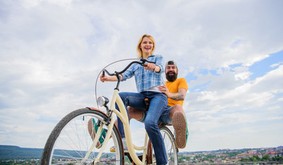 Happy moments. Active leisure tips. Summer holidays ideas. Enjoy summer holidays vacation riding bike. Youth have fun riding bike sky background. Couple in love happy cheerful enjoy cycling together
