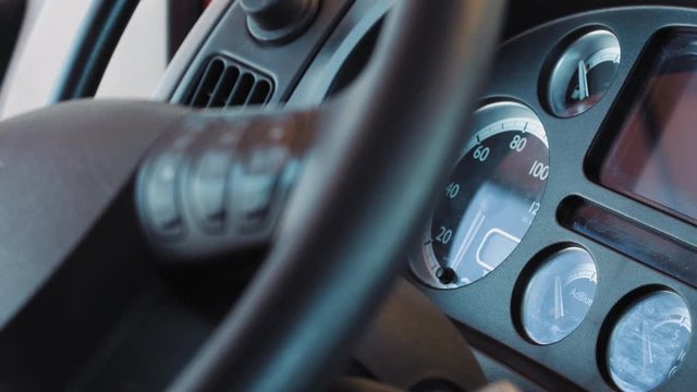 DAF XF Truck Interior Driving Cabin Steering Wheel and Dashboard, Close shot rack focus. 4k footage