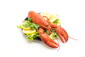 freshly boiled lobster with vegetable and lemon