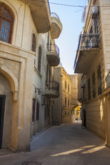 Fototapeta na wymiar Baku - June 6, 2017. Narrow street of Icheri Sheher - Old Town in Baku, Azerbaijan