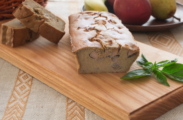 Oat cake on fruits background, side view