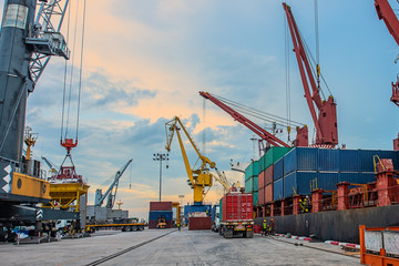 container port terminal working busy in operation of loading and discharging shipment being for...