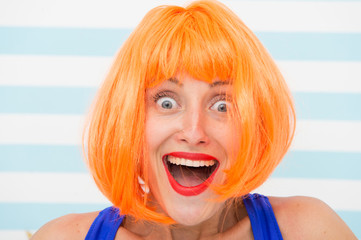 happy crazy girl with omg or wow facial expression. happy girl with crazy look. wow. surprised happy girl with orange hair. crazy look of girl saying omg. what a surprise. feeling and emotions - obrazy, fototapety, plakaty