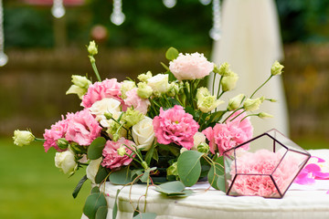 wedding flowers on a table outdoors