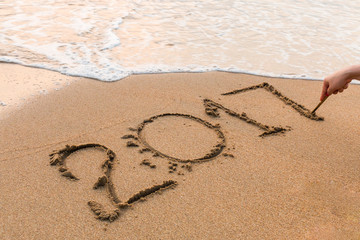 2017, a message written in the sand