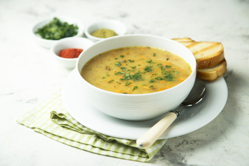 Pea and lentil soup with chili oil