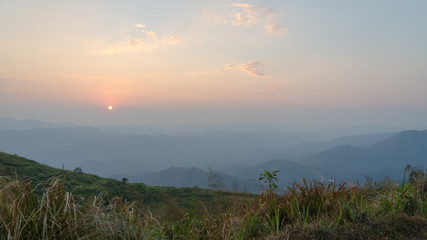 Obraz premium Mountain field during sunset. Beautiful natural landscape, Kanchanaburi, Thailand