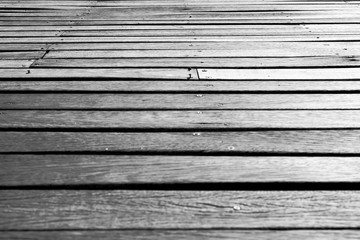 close up on a black and white wooden deck
