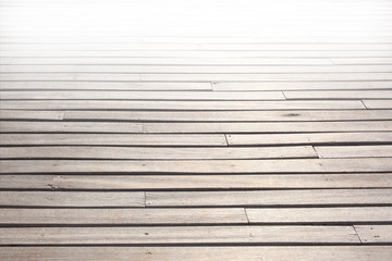 Obraz premium close up on a wooden deck fading in backlight