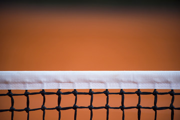 tennis court net, outside in a tennis court