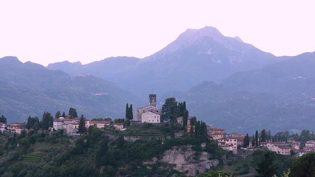 Tuscany twilight rural landscape with house, cypress road and hills