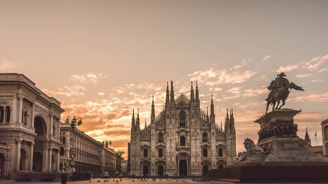 milano city center duomo square cathedral with monument sunrise summer day time lapse