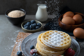 Pancakes with berries and sugar