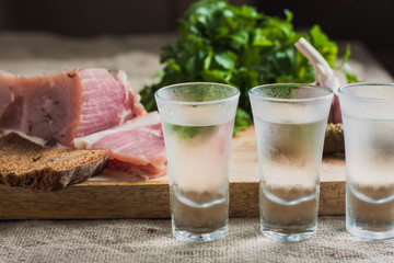Russian drunkenness - vodka and snack - lard, garlic, bread