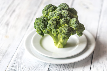 Fresh broccoli on the white plate