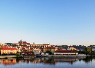 View over Vltava River towards Lesser Town and Castle at sunrise, Prague, Bohemia Region, Czech Republic