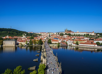 Fototapeta na wymiar View over Vltava River and Charles Bridge towards Lesser Town and Castle, Prague, Bohemia Region, Czech Republic