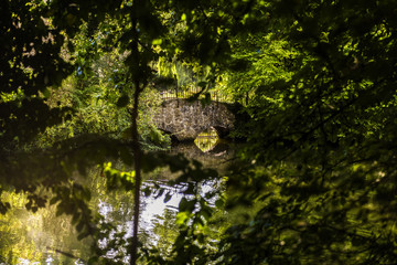 Small Stone Bridge on the River Medway near Maidstone in Kent, England. Taken on a beautiful sunny Autumn afternoon. The photo was taken between Maidstone and Allington locks.