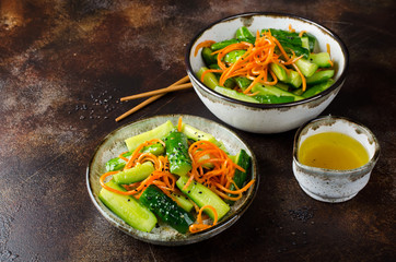 Cucumber salad with carrots and sesame seeds