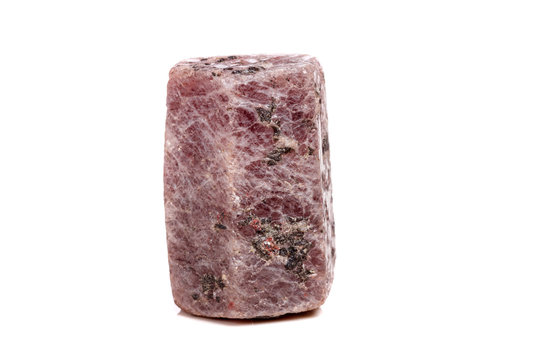 Macro mineral stone Ruby in the breed a white background