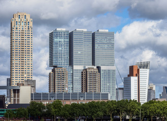 Fototapeta premium View over Maashaven towards De Rotterdam and KPN Tower buildings, Rotterdam, South Holland, The Netherlands