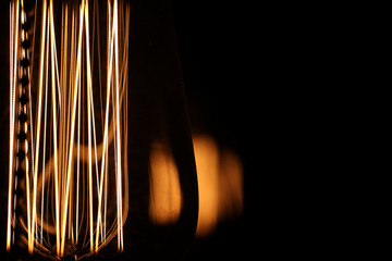 Lamps with tungsten filament. Edison's light bulb. Filament fila