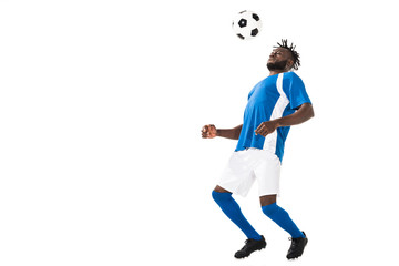 athletic african american sportsman hitting ball with chest isolated on white