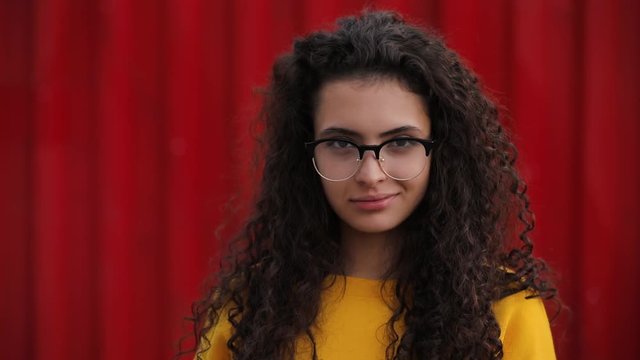 Teen girl wear decorative fashionable transparent eyeglasses