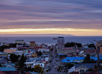 View over city towards Strait of Magellan at sunrise, Punta Arenas, Magallanes Province, Patagonia,...
