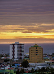 View over city towards Strait of Magellan at sunrise, Punta Arenas, Magallanes Province, Patagonia,...