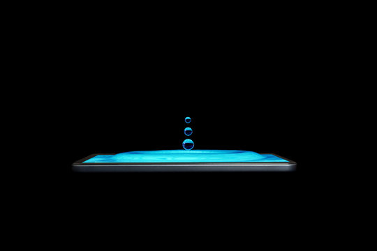 Conceptual creative 3D volumetric photo of water droplets with splashes in a smartphone isolated on a black. Drops of water fall into the smartphone. volumetric 3D photo.