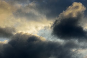 Clouds in sky with dark and orange color