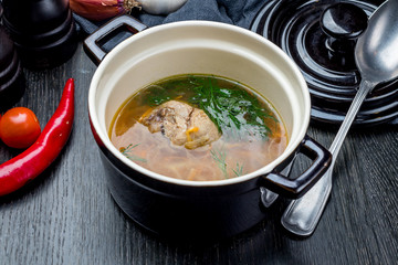 Chicken soup bouillon in a plate