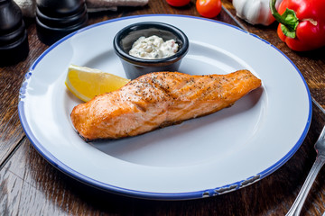 Salmon steak on the grill
