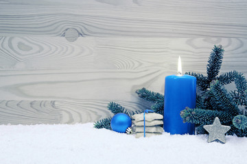 Christmas cookies and blue Advent candle. Christmas card.