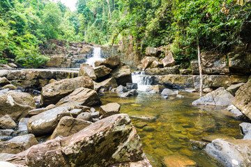 Naklejka na ściany i meble Klong Yai Kee Waterfall in tropical rain deep forest in Koh Kood island