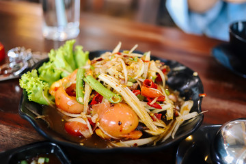 Papaya Salad, Thai National food, Spicy papaya salad with raw crab