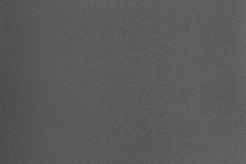 dark grey textured background / macro texture of the fine fraction