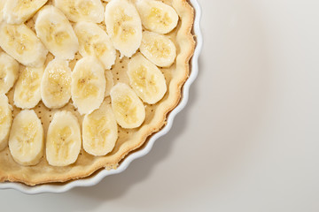 Banana pie on a white background