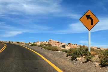 Traffic Sign on the Road to the Altiplanic Lagoons of Atacama Desert, Northern Chile, South America