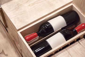bottle of red wine in wood box