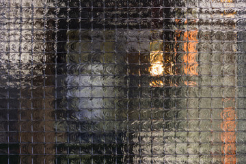Closeup stained translucent glass window texture 