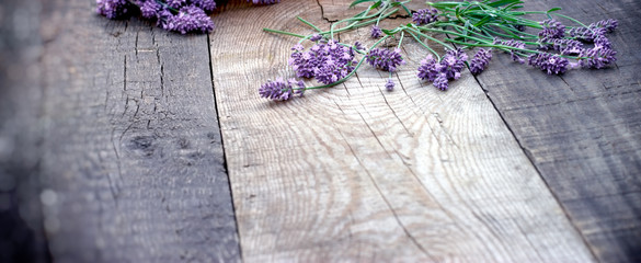 Lavender flower on wooden rustic background - table