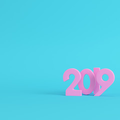 Pink new year 2019 figures on bright blue background in pastel colors