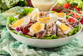 Nicoise Salad with tuna, anchovy, eggs and tomatoes