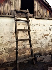 the wooden staircase to the loft of the barn