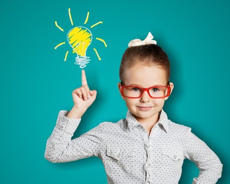 Little Girl Has And Idea On Chalkboard