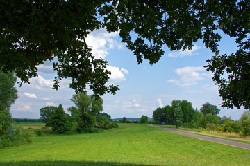 on the road with clouds