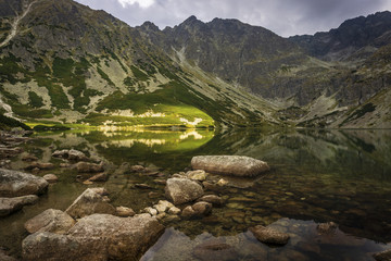 Black Pond Gasienicowy beautiful clean mountain lake. Tatra Mountains. Poland.