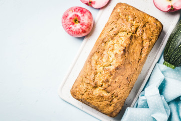 Zucchini apple loaf cake. Top view, space for text.